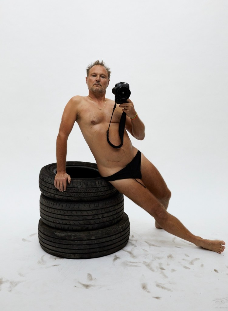 As Teller turned the camera on himself, exposing a rounded belly, abdominal scar and even his pale, bikini-clad backside