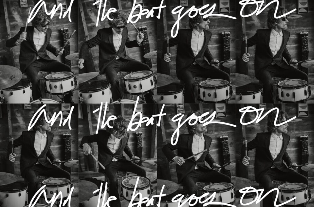 Jacket ($2,850), shirt ($750), trousers ($1,300), and sunglasses ($460), Celine Homme by Hedi Slimane.