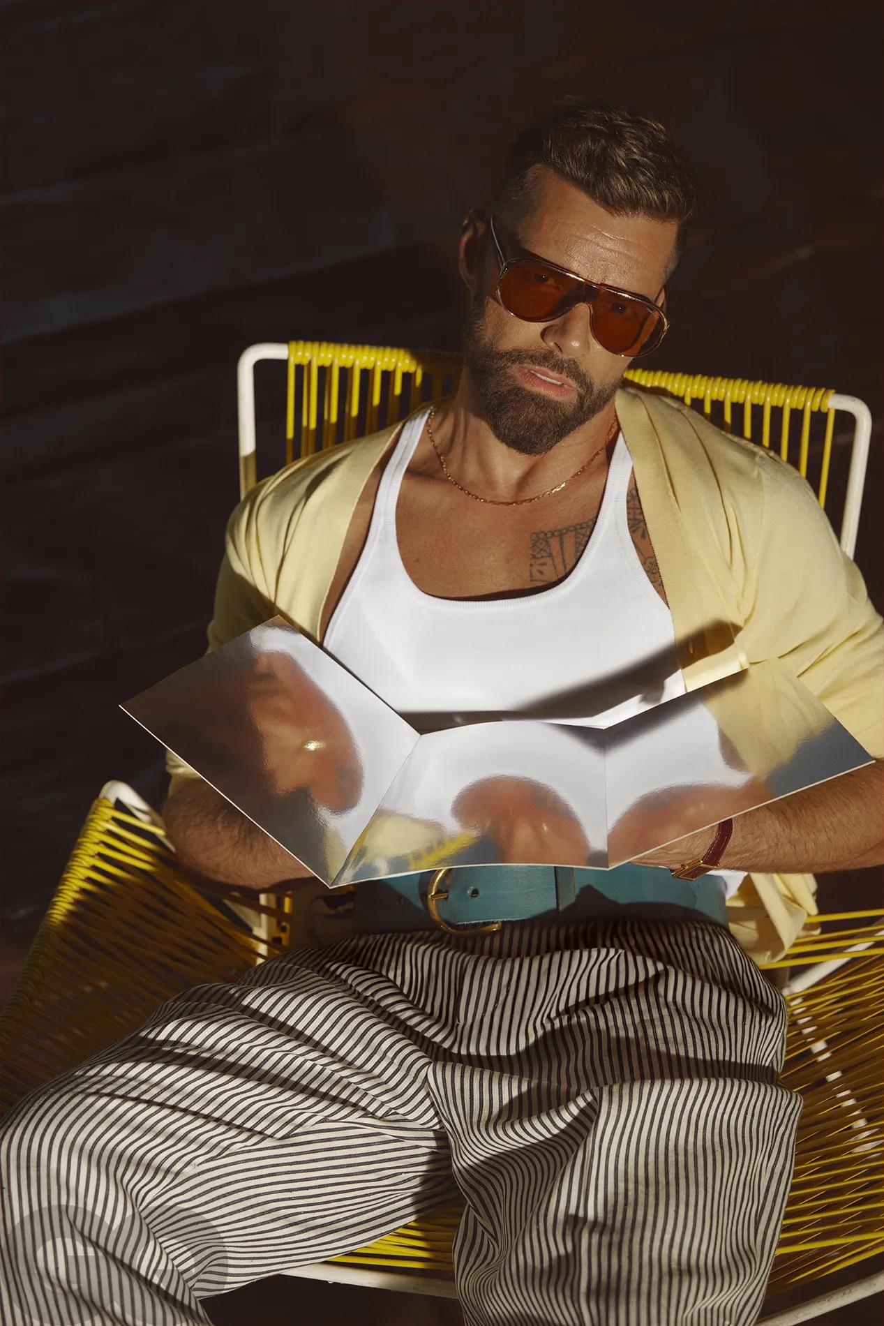 Dsquared2 jacket. Ferragamo T-shirt. Umit Benan B+ Pants. Artemas Quibble belt. Tom Ford sunglasses. Cartier watch. Shay Jewelry necklace.