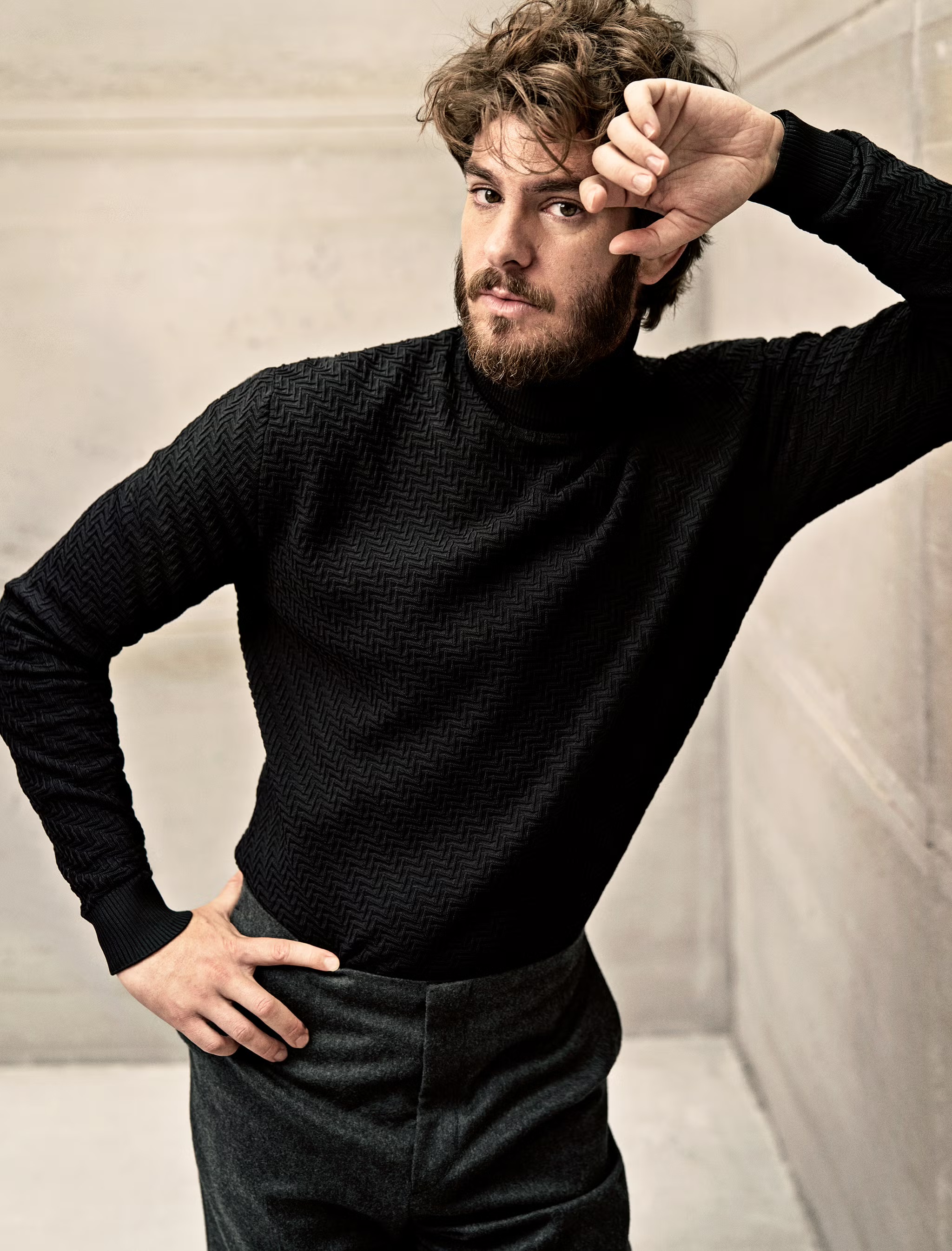 Andrew Garfield discusses his evolving career, exploring his roles in ‘We Live in Time’ and ‘Spider-Man,’ and the personal challenges and joys of balancing fame and artistry.